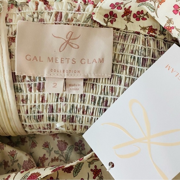 New Gal Meets Glam Floral print Jumpsuit Puff Sleeve Tie Belt Size 2 - Picture 13 of 15